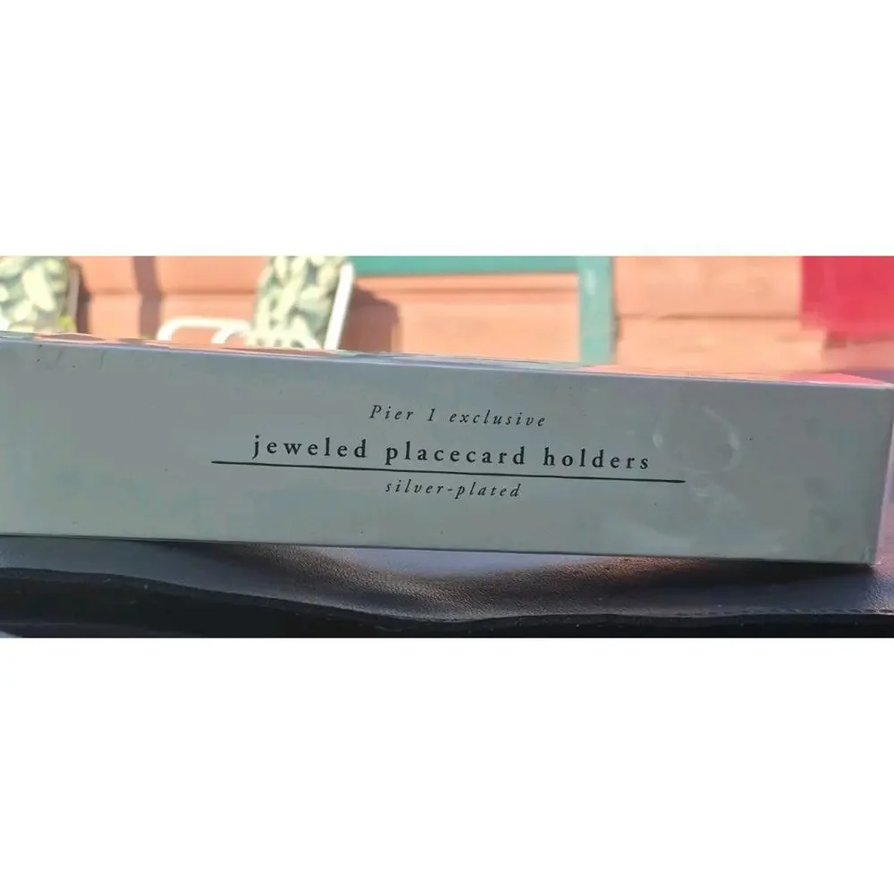 4 Pier One Jeweled Placecard holders. Silver plated Jeweled